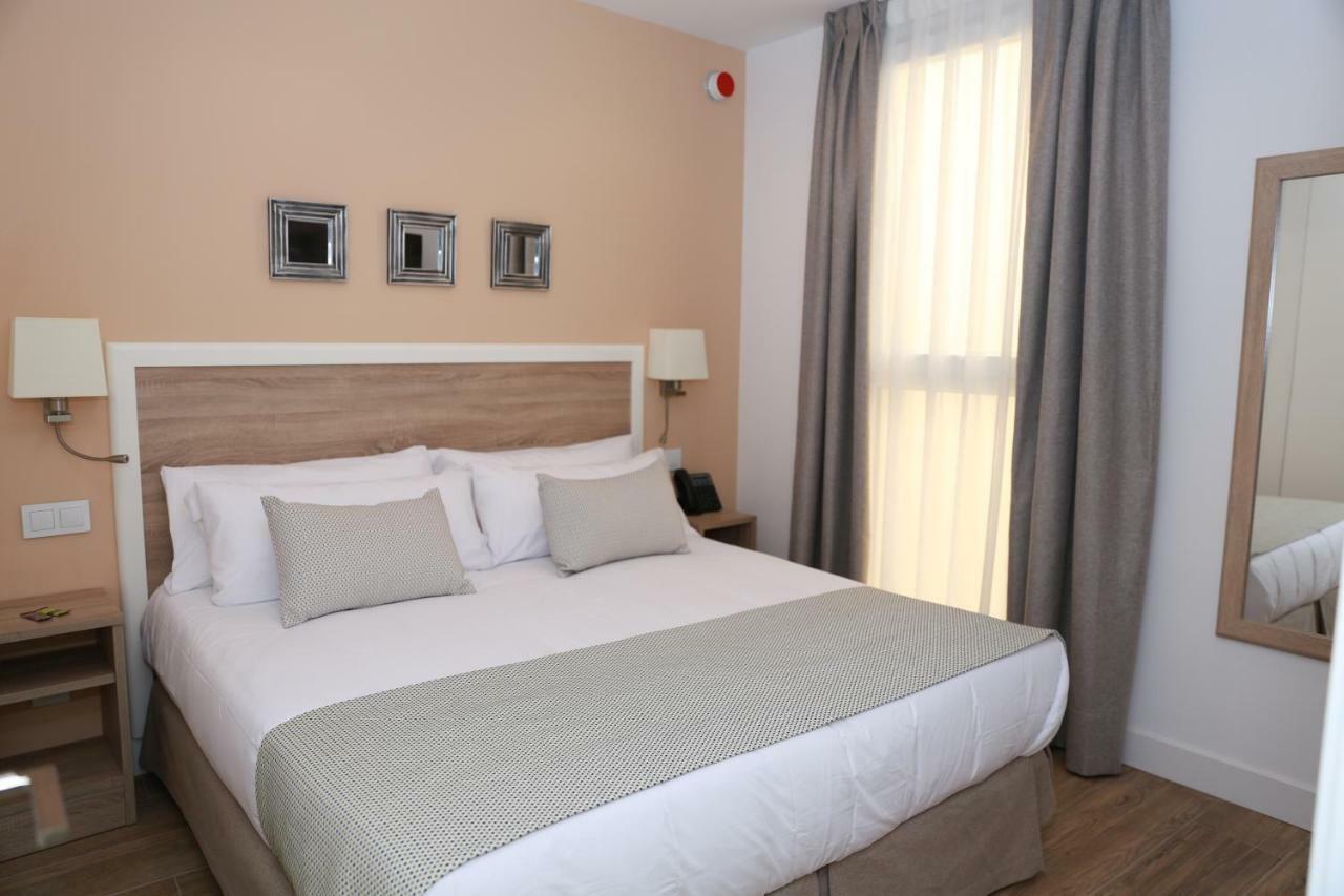 New Point Opera Aparthotel Madrid Bagian luar foto