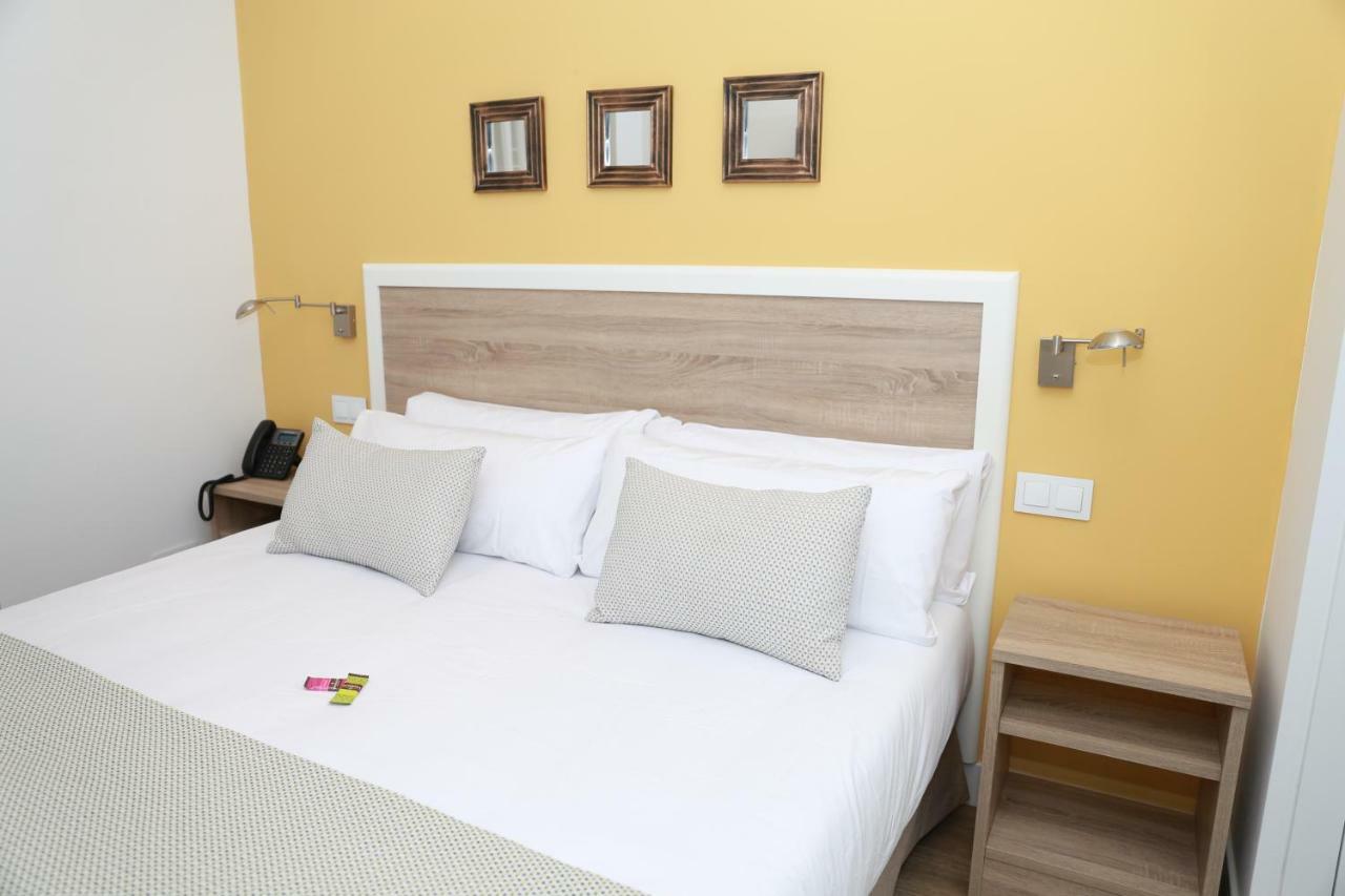 New Point Opera Aparthotel Madrid Bagian luar foto